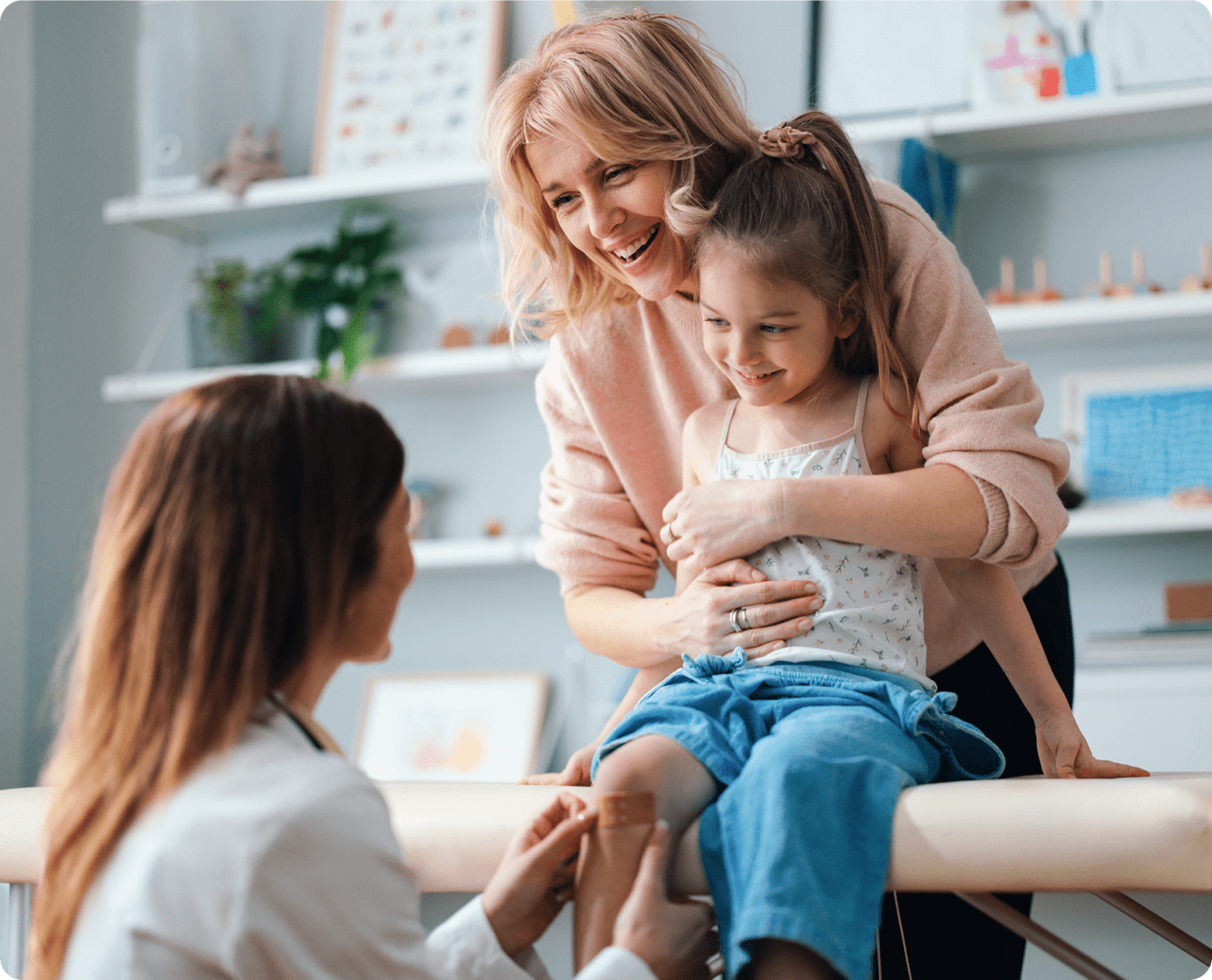 Child with parent at a doctor's appointment.